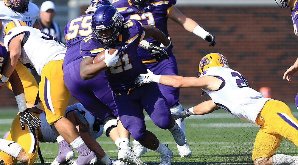 Markeith Miller breaks past a Hardin-Simmons defender. (Photo by Joe Fusco, d3photography.com)